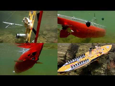 Cardboard ship and submarine model sinking, torpedo attack and hitting a sea mine, ship wreck