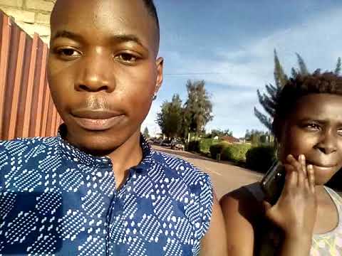 Nilla & Kelly Wayne walking in gikondo street