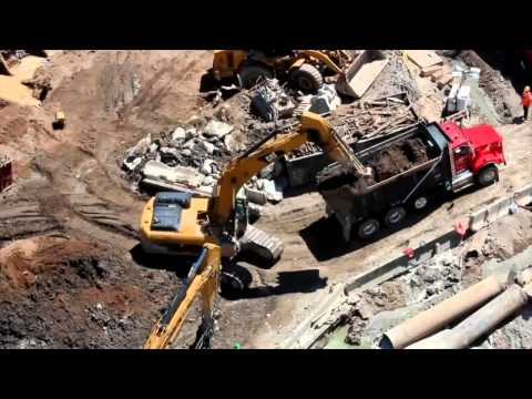 Cat 330 loading a truck