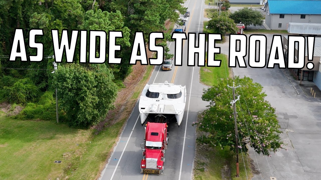 ⛵️Hurricane-damaged DIY catamaran. Our final move. She's as wide as the road! Ep 641