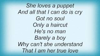 E - She Loves A Puppet Lyrics