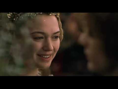 Tristan & Isolde trailer frame of a torchlit procession matching the cue 'Wedding Cortege'