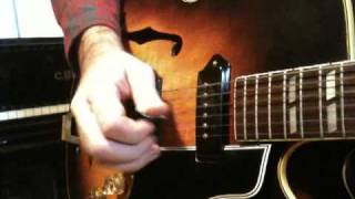 How to play a simple Chet Atkins finger picking tune called TRAMBONE