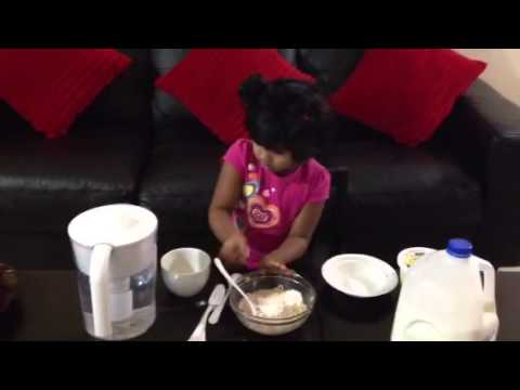 Priscilla making a cake for me