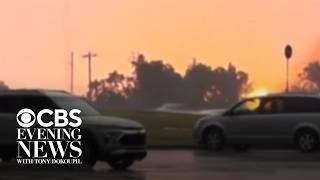 Gray skies turn bright yellow after lightning strike causes gas tanks to explode in Oklahoma