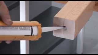 Fixer un support fixation au sol pour poteau en bois