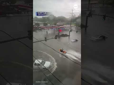 Man rides Jet Ski through Virginia floods