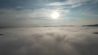 DJI fpv drone, breaking through the clouds
