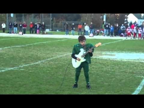 9 Year old Ian Hoey plays National Anthem on guitar