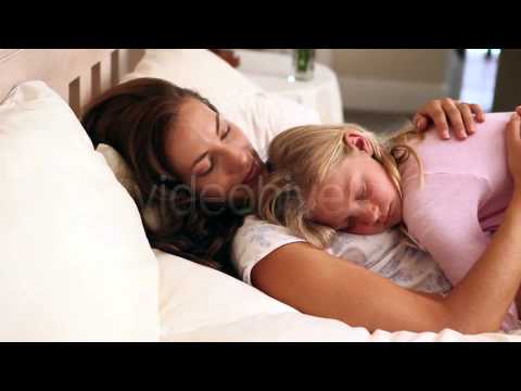 Stock Footage - Mother And Daughter Sleeping Together In Bed 5 | VideoHive ▶