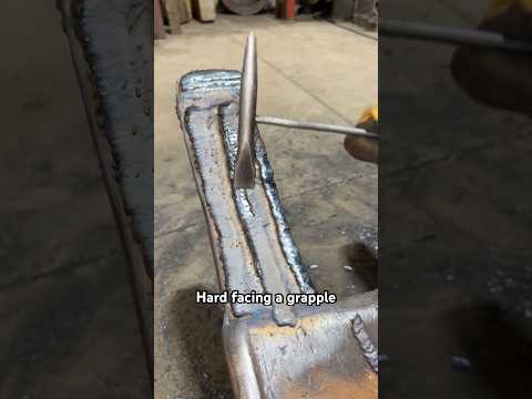 hard facing a grapple for an excavator #shorts #welding #bluecollar #work #fcaw #repair #fabrication