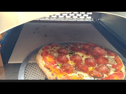 The new Bighorn gas pizza oven first fire up and pizza cook