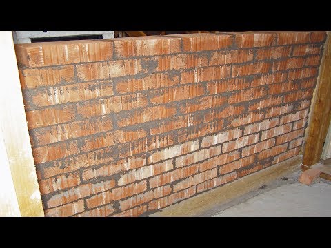 Strawbale Vlog 64 - a heat accumulating wall made of bricks with clay mortar