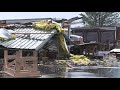 Surveying the damage left by a tornado in Union County