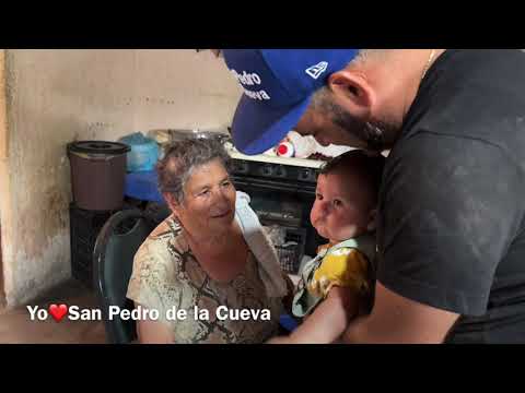 Cake for Merce Lameda on her 83rd birthday with Rosa Lameda and Faviola