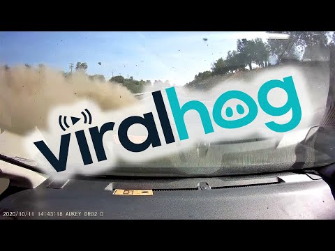 Overtaking Car Crashes into Barrier || ViralHog