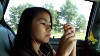 Me doing a flip and Sabrina taking a tour of my bag!