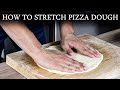 How To Stretch THIN CRUST Pizza Dough By Hand For Beginners