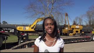 Workers cleaned up railroad tracks after derailment in Petal