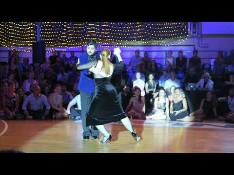  Fernando Sanchez  and  Ariadna Naveira  are  dancing  to  the  tango  "  El Olivo  "  by  Juan D'Arienzo  at  A los amigos tango festival  in  2019