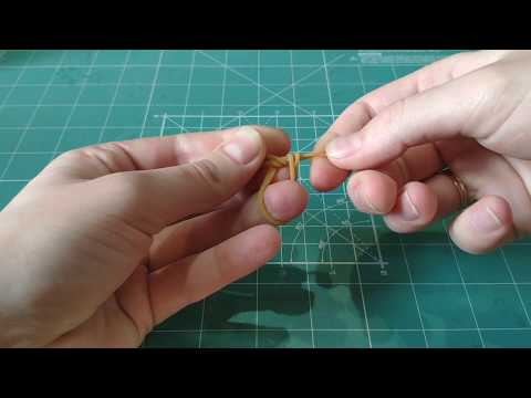 How to make a knot from the thin rubber band during assembly of the Ugears Card Holder