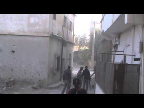 اشتباكات بين عناصر لواء شهيد حوران وقوات النظام في حاجز البريد في مدينة درعا