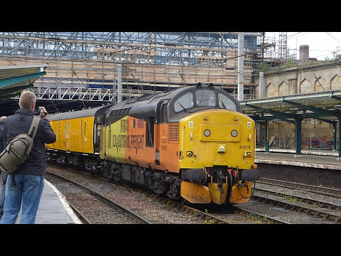 Colas 37219 and 37116 depart Carlisle