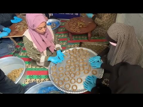 Volunteers prepare traditional pastries in southern Gaza for Eid celebrations | AFP