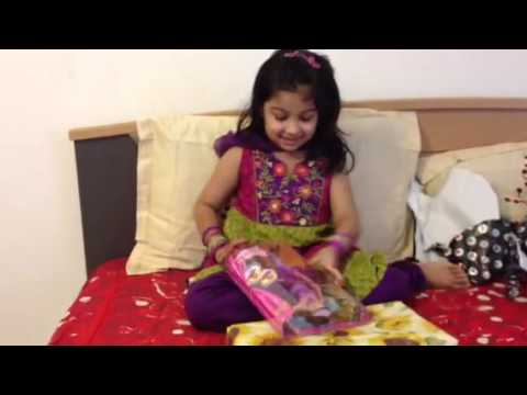 Simrah opening Eid gifts 2013