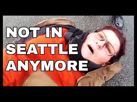 "This Isn't Seattle": Cops Have Hysterical Interaction With Purple-Haired Woman