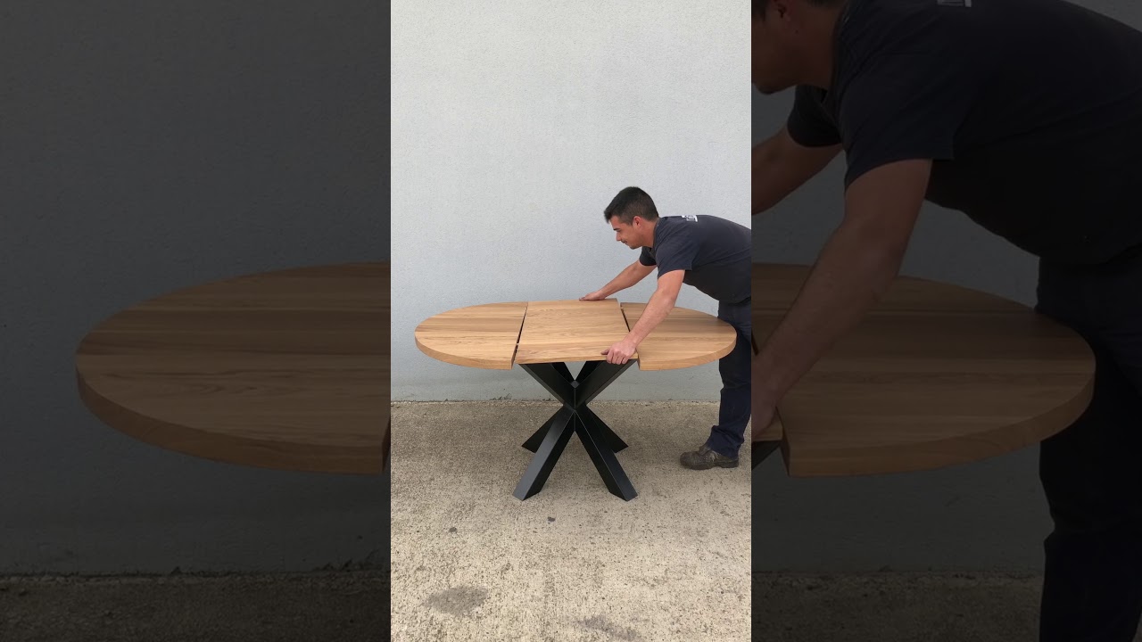 Mesa de comedor redonda extensible de estilo industrial por Mesarte Artesanos