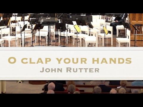 "O clap your hands", composed and conducted by John Rutter