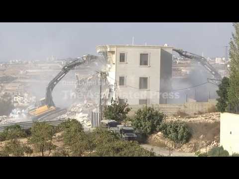 Israel demolishes Palestinian buildings in West Bank after deadly attack near Hebron