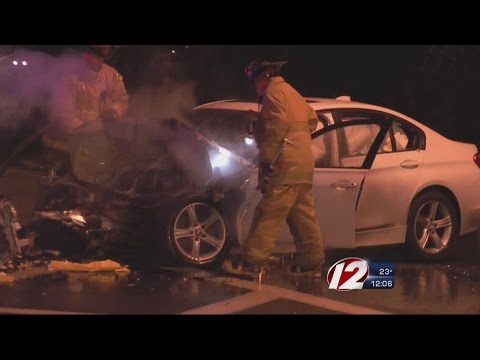 Car Strikes Barrier, Bursts into Flames