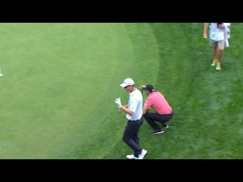 John Senden holes a 29-foot chip for eagle at BMW