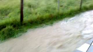 preview picture of video 'Riedau Dammbach Hochwasser nach Gewitterregen 06/2009'