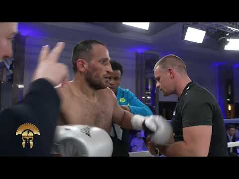 Ex-GLORY champ Harut Grigorian dominated title match to earn a hard-fought UD win over Alex Amariței