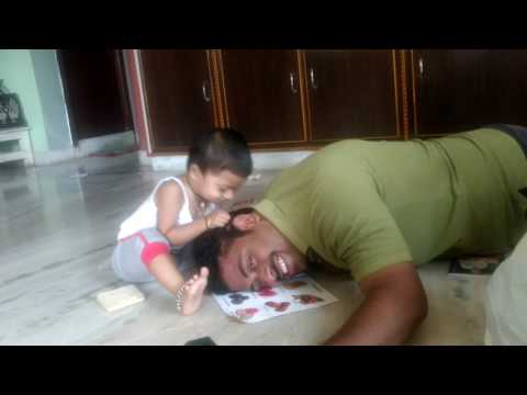 Baby feeding fruits to her father in a funny way...