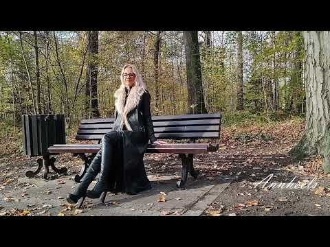 Ania - walking black boots and crush leaves