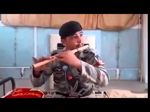 Pakistan army man playing Bansuri