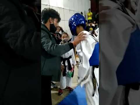 Sujal Mehra .blue chest guard.great fight . bright Taekwondo Academy/