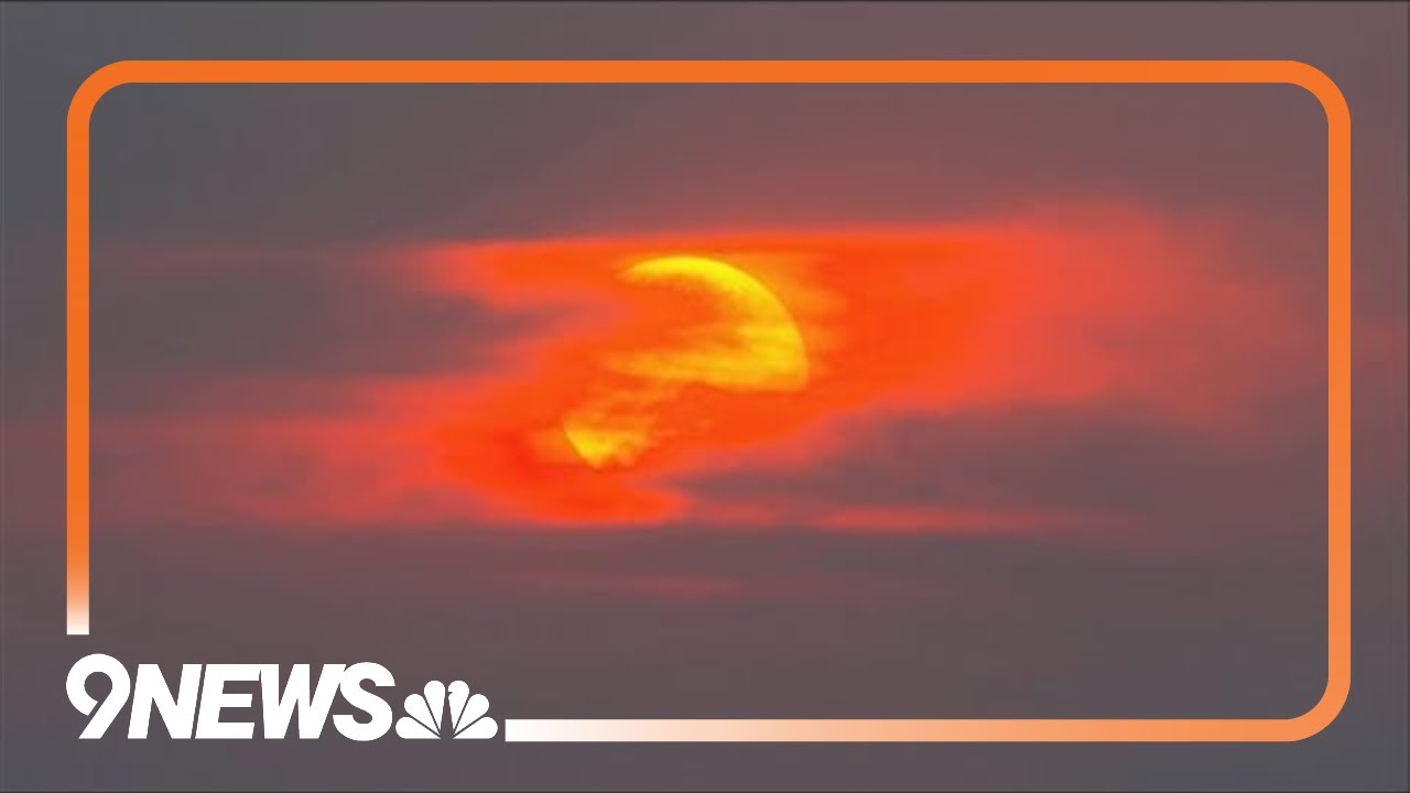 Wildfire smoke creates orange sunrise in Denver