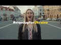 Ukrainian refugee sings with Lithuanians in support for Ukraine