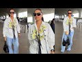 Neha Dhupia Is A Sight To Behold In An Blue Jeans White Outfit At Airport