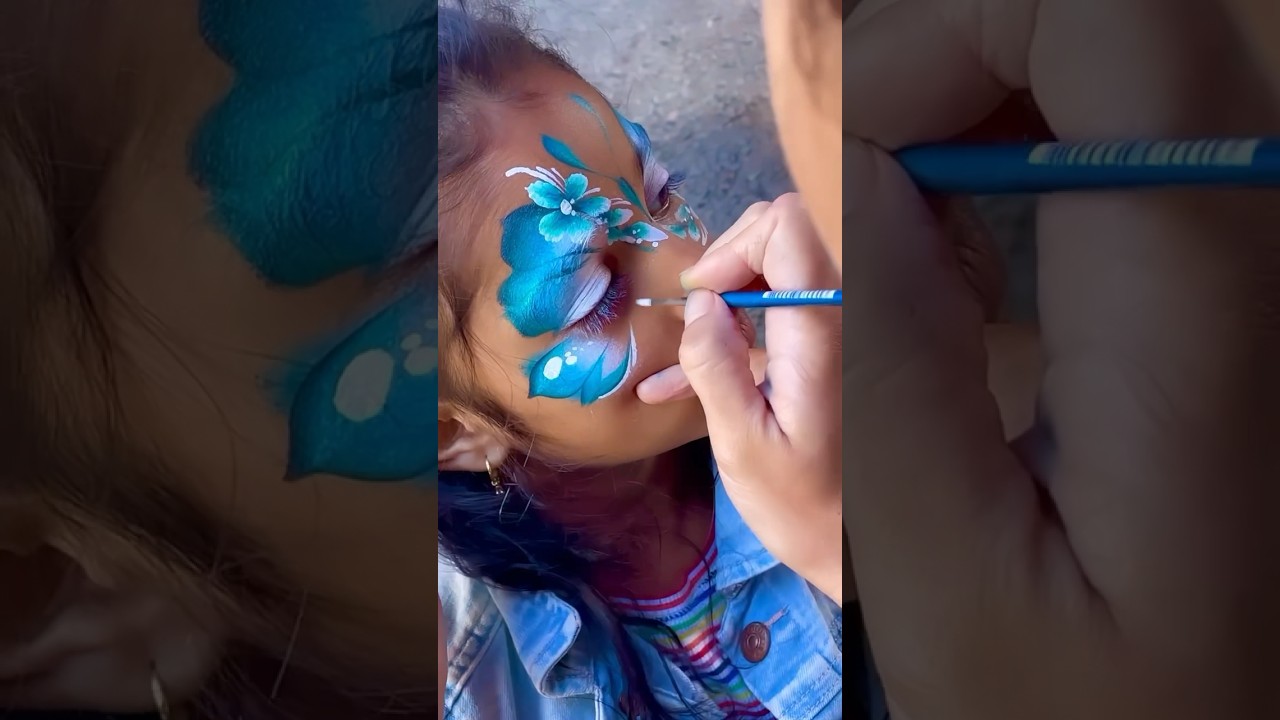 Blue butterfly face paint