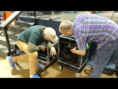 Sound system setup for a fair.  Overview of the labor and work involved - Event Video 48