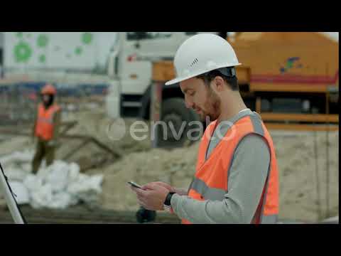 Construction Worker Using Cell Phone | Stock Footage - Videohive