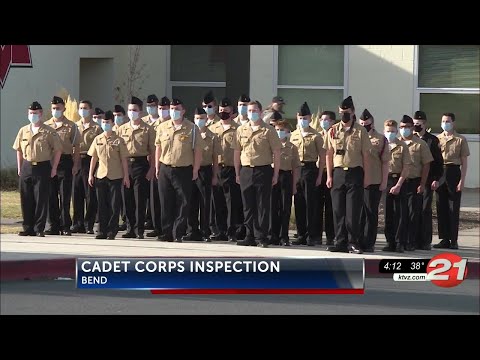 Cadet Corps marches for inspection