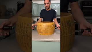 Opening a 90lb cheese wheel - Parmigiano Reggiano