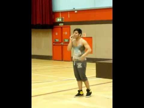 Gathan Cheema sings "I Will Always Love You" during a Thriller dance training session